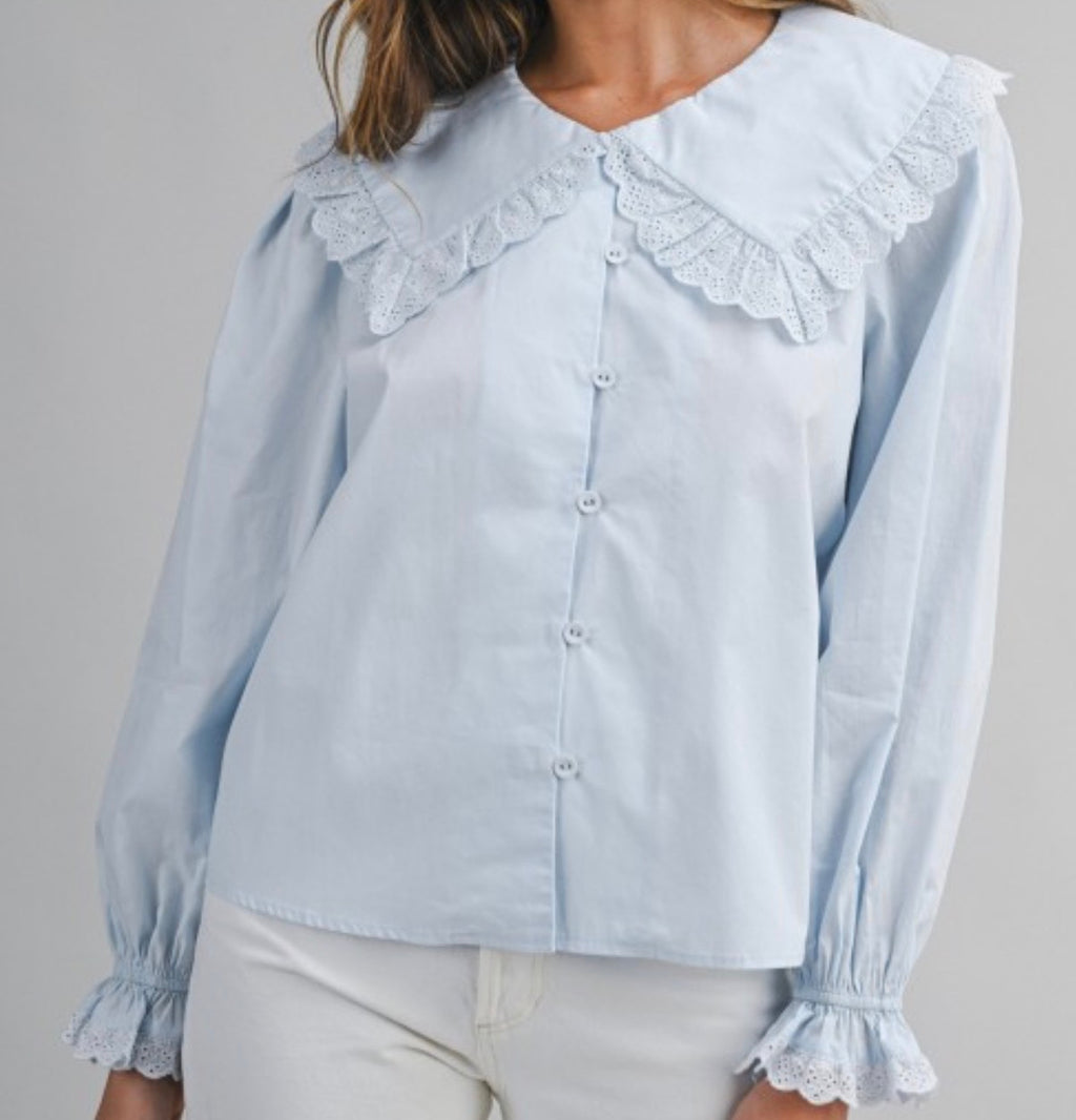 Blue light blouse with collar and long sleeves
